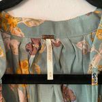 Free People  So Fine Smocked Blue Floral Butterfly Flowy Blouse Women size Medium Photo 1