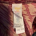 LuLaRoe Red and Orange Patterned Leggings Photo 2