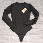 Jordan  flight tight fit bodysuit size small Photo 0