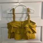 Essue Yellow flowy sleeveless tiered crop top Photo 1