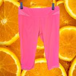 Under Armour Pink and Orange Short Leggings Size Medium Photo 1