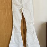 SheIn Flare off white jeans from , high-waisted. Size is small (US 4) Photo 1