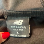 New Balance women’s black 1/4 zip with polyester hoody size large Photo 6