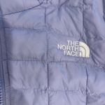 The North Face Purple puffer jacket Photo 1