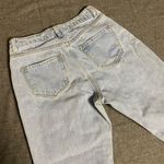 Forever 21 Ripped Jeans Light Wash, torn leg, elastic Ankle, tapered Size small Photo 1