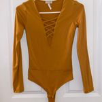 A'Gaci Long Sleeve Criss Cross Bodysuit Photo 1