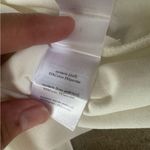 We Wore What  Women's Cream White V-Neck Ruched Top cotton spandex fitted ivory Photo 3