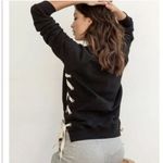 Sincerely Jules Side Lace Up Crewneck Sweatshirt in Black Photo 3