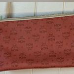 MCM  mini purse also comes with a crossbody strap Photo 1