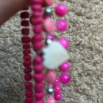 Set of 3 women’s‎ pink beaded charm bracelets OS stretches measurements shown Photo 5