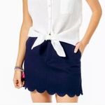 Lilly Pulitzer navy blue scalloped skirt with gold button and pockets Photo 1