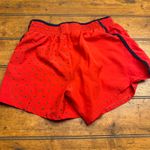 Nike Dri Fit Running Shorts Women's XS Red Blue Star Print Athletic Performance Photo 2