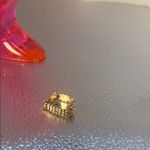 Beautiful gold ring with dainty flowers. There are three flowers adjustable Photo 4