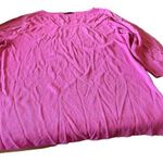 Cyrus top, pink with cutouts on the top portion and both sleeves. Photo 0