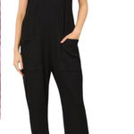 Fuschia Women's Jumpsuit. Size M Pink Size M Photo 0