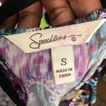 2000s y2k Multicolored paisley print short sleeve top blouse with black belt to cinch in the waist. Photo 2