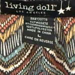 Living Doll Black and Brown Top with Chic Design Photo 3