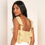 Lulus  Sweetest Frills Yellow Print Tie-Strap
Smocked Bodysuit Photo 1