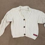 Taylor Swift  Red Cardigan TV Photo 0