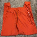 Alphalete  Orange Joggers Photo 0