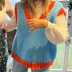 Orange And Blue Sweater Vest Photo 1