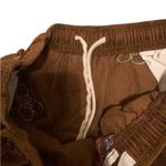 Urban Outfitters  Corduroy pull on pants with embroidered flowers size L Photo 4