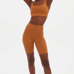 Girlfriend Collective High-Rise Biker Shorts in Caramel Photo 0