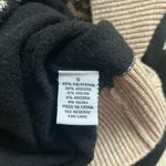 Leopard Lightweight Sweater – Size Small
Stylish & Unique | Subtle Sparkle | Black Photo 5