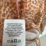 Laila Ali tan & pink animal print long sleeve shirt with tie up front and hood. Size XS Photo 7