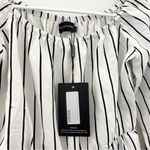 Pretty Little Thing white and black striped long sleeve off the shoulder romper Photo 2