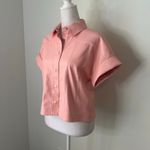 Alice + Olivia  light pink faux leather short sleeve button front top size XS Photo 2
