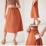 Athleta  Coral Midi arrival travel Skirt size 12 new NWT Photo 8