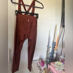 Free People Movement NWT Shine Bright Crop & Legging Set size xs Color: Brown Cognac  Sold as is no refunds returns or cancellations Photo 1