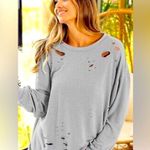 Romeo + Juliet Couture  distressed light blue sweater with open tie sides size Sm Photo 0