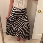 H&M  animal print satin skirt. Fits xs Photo 4