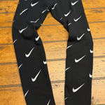 Nike  Women's Black All Over Swoosh Logo Leggings Pants Size Small Photo 0