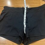 Tropical Escape  women’s black swim shorts size 10. Photo 5
