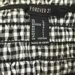 Forever 21 Black and White Smocked Peplum Tank Top Photo 2