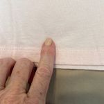 Nirvana  size large fits like a medium light pink short sleeve band T-shirt EUC Photo 5