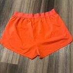 Gymshark Women's Orange Athletic Shorts Photo 4