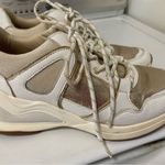 ALDO  Vany gold and white tennis shoes women’s size 7.5 in great shape Photo 0