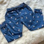 Disney NWT Mickey and Minnie Mouse Christmas Holiday Denim Jogger Jean Pants L Photo 1