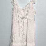 Women’s Live to be Spoiled white eyelet mini dress cut out and flutter sleeves Size L Photo 1