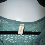 Tiny  Button Front Criss Cross Tie Back Sleeveless Top Photo 2