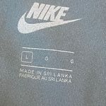 Nike Women’s Sportswear Femme Floral Logo 7/8 Teal Leggings Photo 7