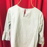 Jennifer Grace . Green/white stripped blouse with pearls in the front and flares on the sleeves. Photo 0