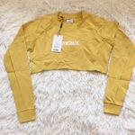Gymshark Women’s Powder Yellow TRAINING CROPPED SWEATER Top size XS Photo 0