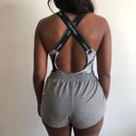 Calvin Klein NWT Urban outfitters  cross back logo bodysuit in black motif Photo 1