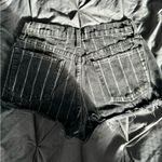 Reformation Dixie short black with white stripes.
Size 25 Photo 6