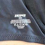 SKIMS  fits everybody unlined underwire onyx black size 36DD Photo 4